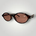 Óculos de Sol Redondo em Acetato Camuflado Marrom com Lentes Rosadas vista frontal