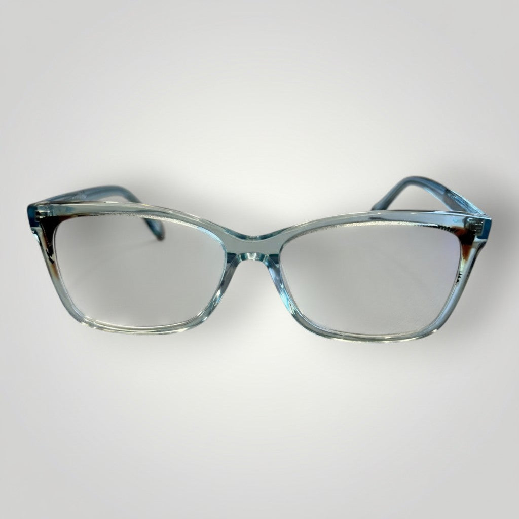 Armação de óculos W One Brand Store retangular em acetato azul tiffany transparente com detalhes laterais. Design moderno e elegante.