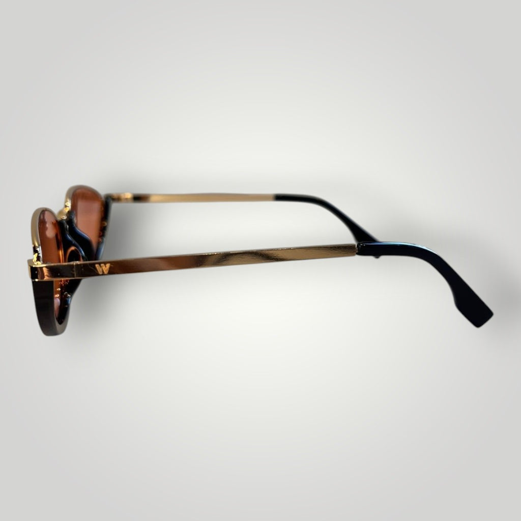 Óculos de sol W One dourados com armação oval em metal e acetato preto, lentes rosas e proteção UV400.