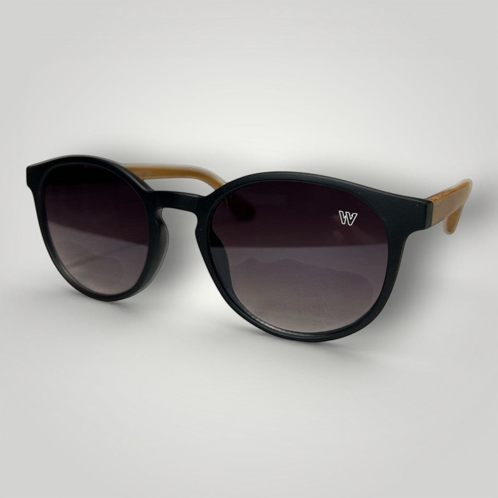 Óculos de Sol Redondo Retrô em Acetato Marrom com Lentes Pretas Hastes Marrom Claro vista frontal