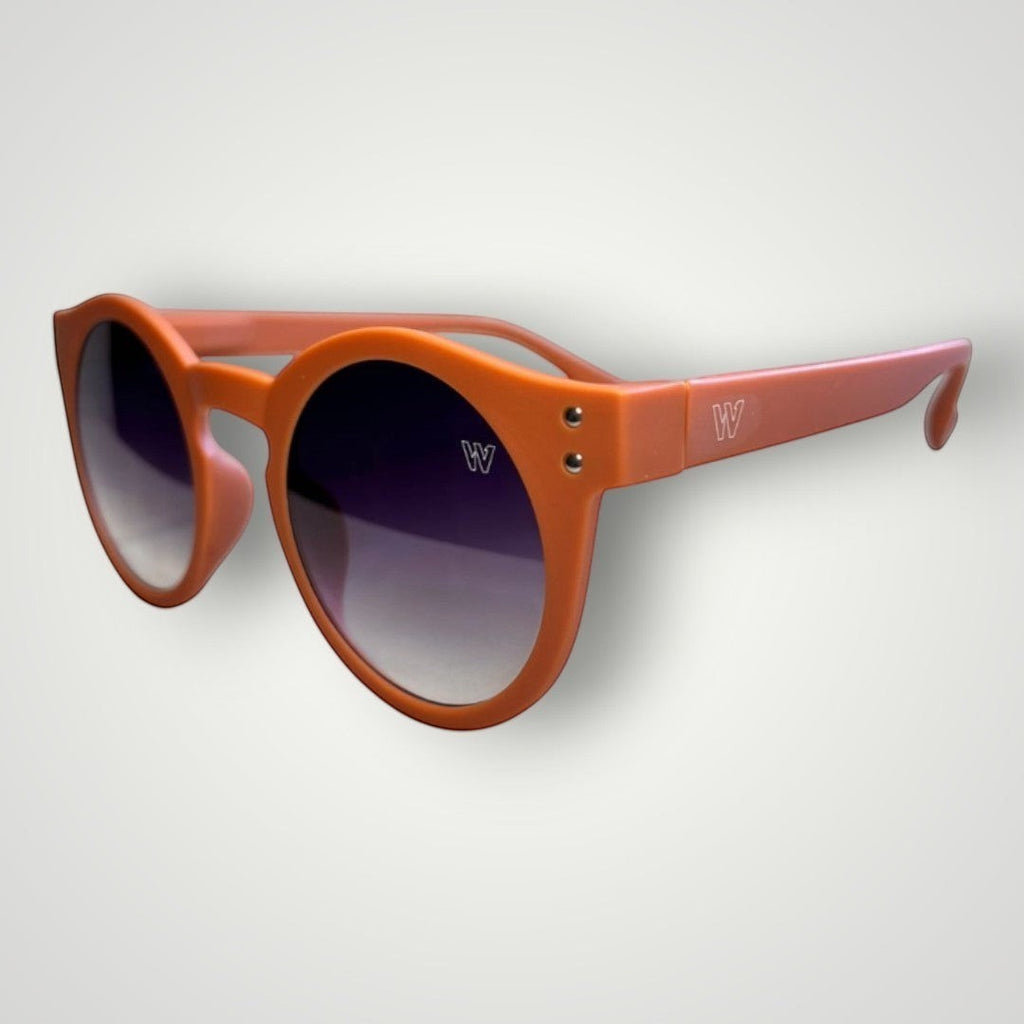 W One Brand Store orange acetate round sunglasses with gradient smoke lenses and UV400 protection.