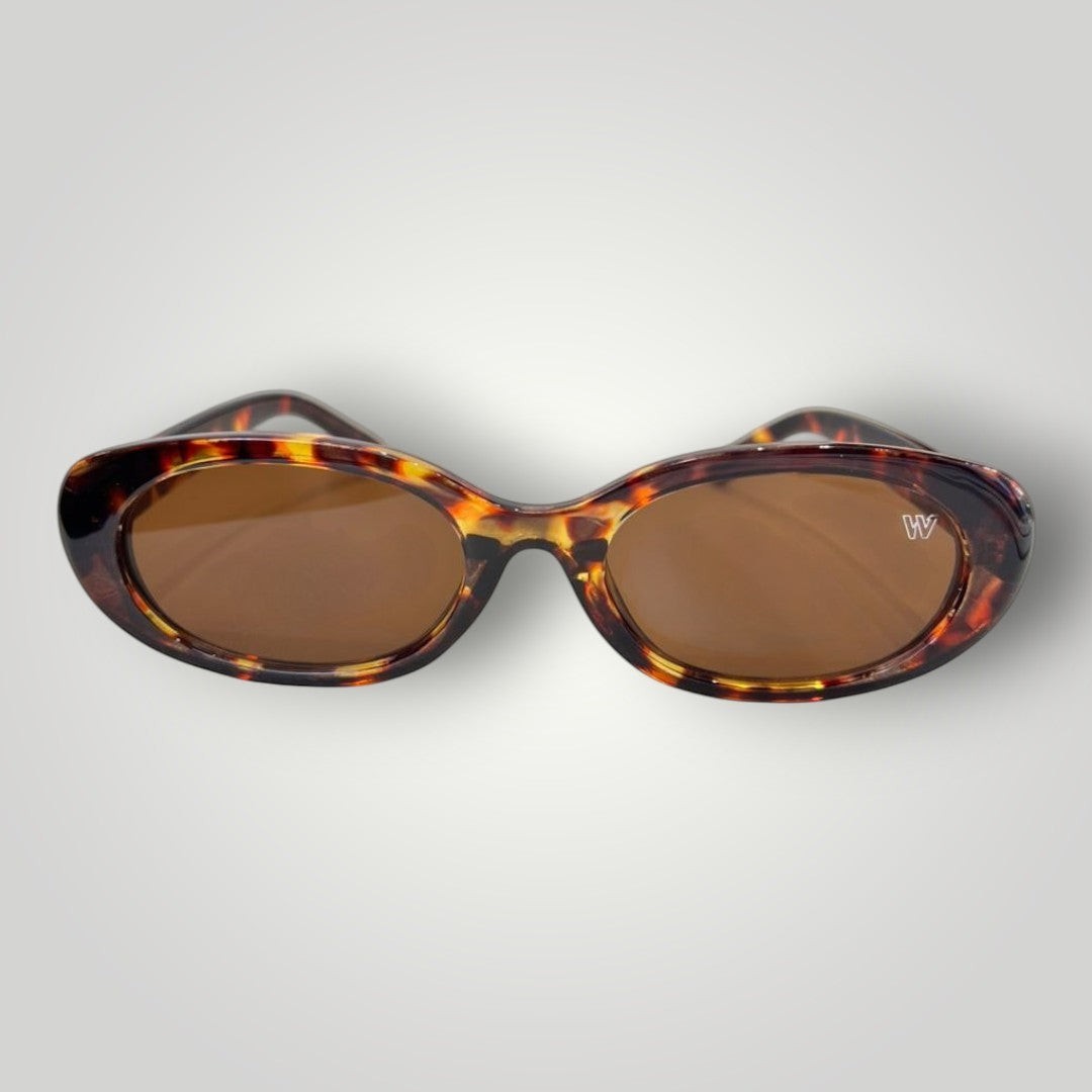 W One Brand Store oval sunglasses in brown tortoise acetate with brown lenses and UV400 protection.