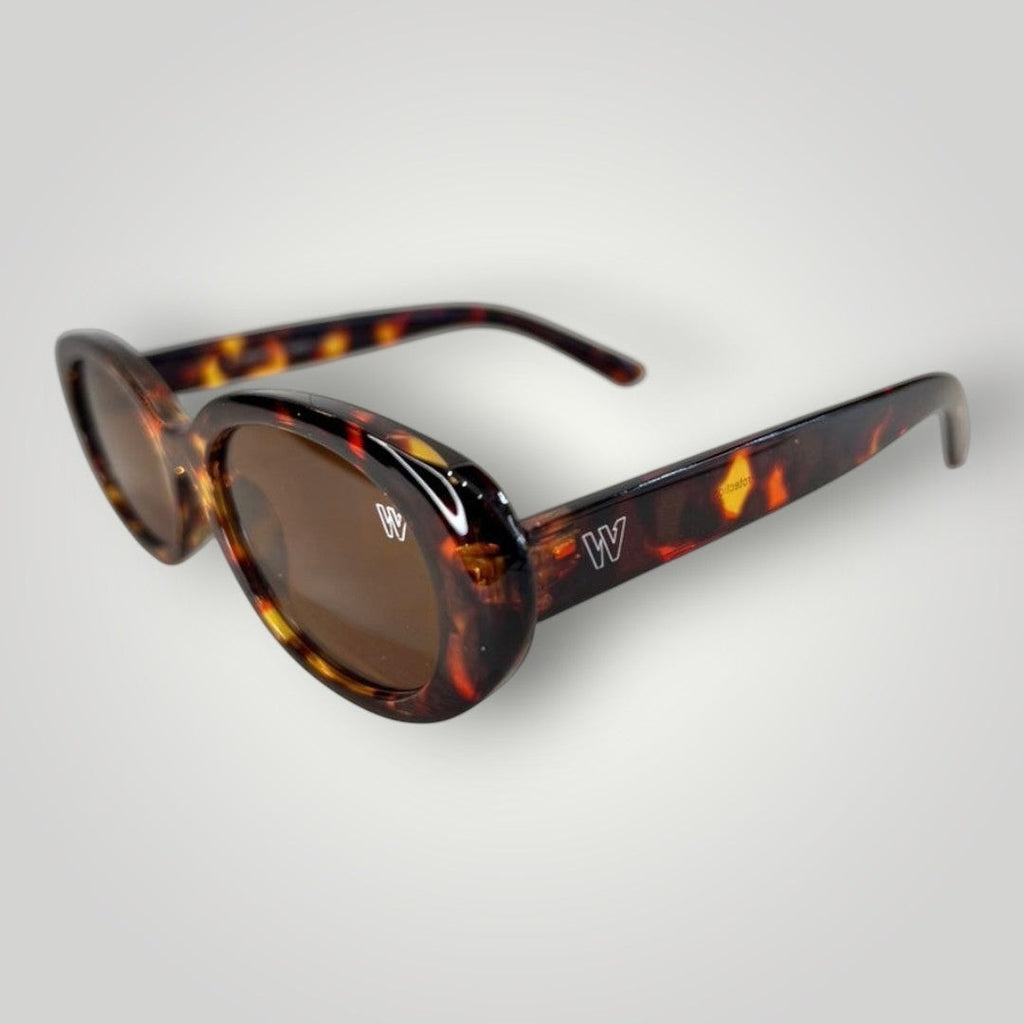 W One Brand Store oval sunglasses in brown tortoiseshell acetate with brown lenses and UV400 protection.