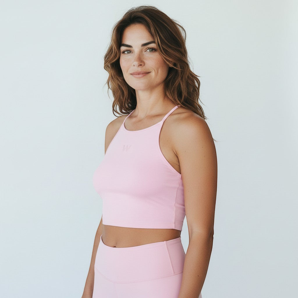W One Brand Store ballet pink high-neck polyamide sports bra with adjustable straps and a band back detail.