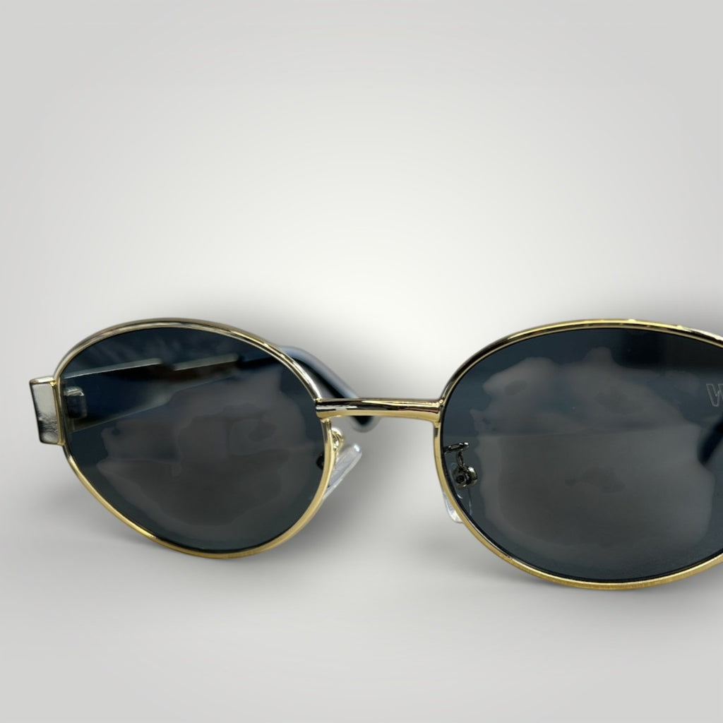 W One Brand Store gold metal round sunglasses with dark grey tinted lenses and UV400 protection.