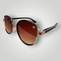 W One Brand Store rounded sunglasses with metal and acetate frame, wine temples, and gradient brown lenses.