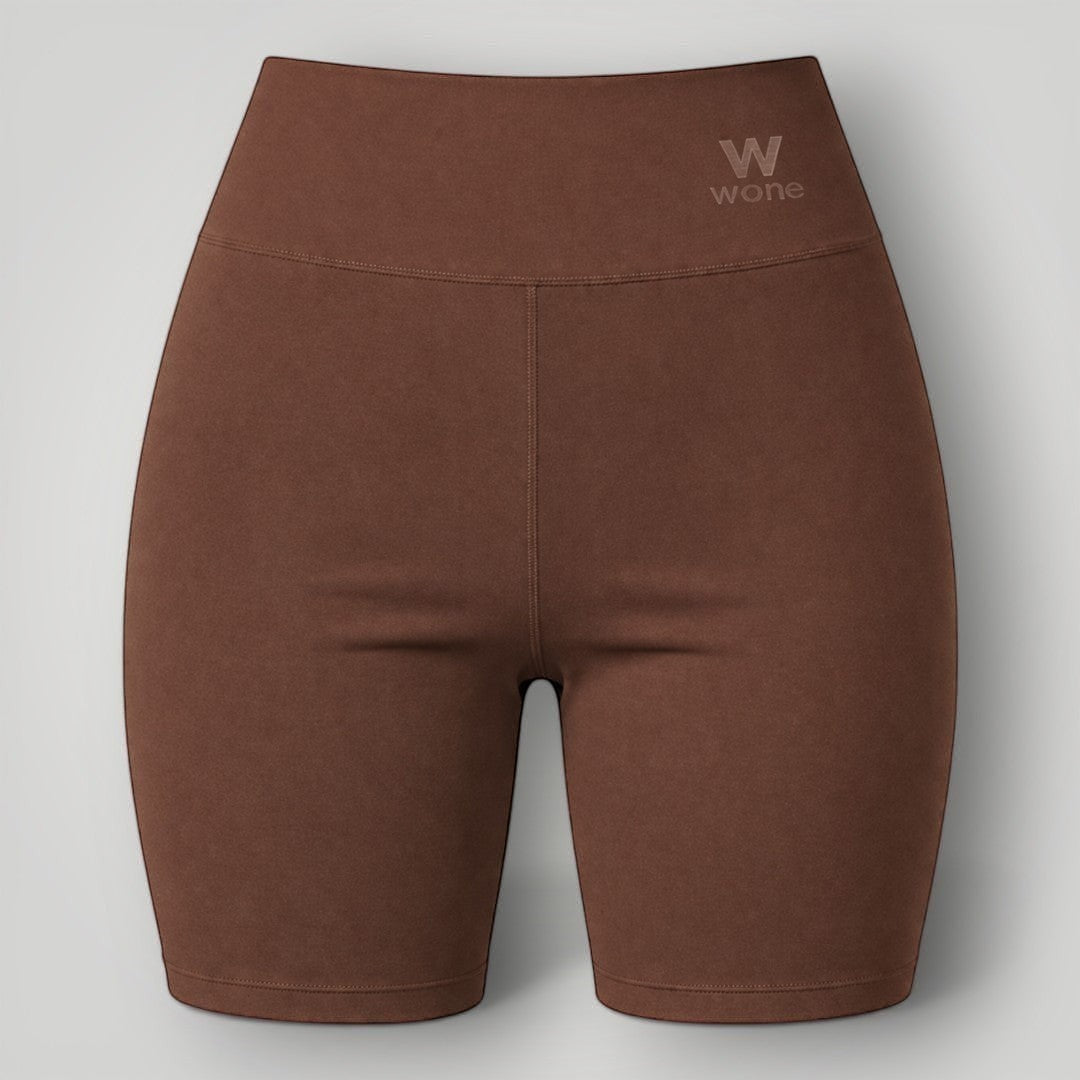 Shorts Essence W One Brand Store na cor coffee com cós largo, tecido de poliamida com média compressão e proteção solar
