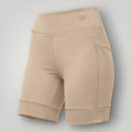 Shorts fitness W One Brand Store cor canela com bolso lateral, tecido de média compressão e cós alto confortável.