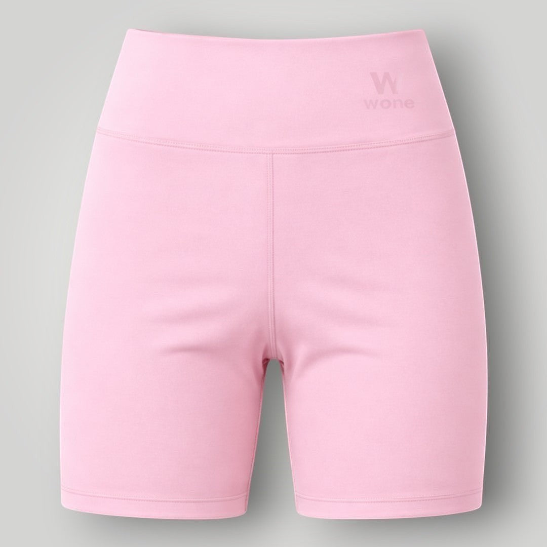Shorts W One Brand Store Essence rosa balé com cós largo, tecido de poliamida com média compressão e proteção solar.