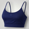 Top esportivo W One Brand Store azul marinho com alças fixas, média sustentação e tecido respirável de poliamida.