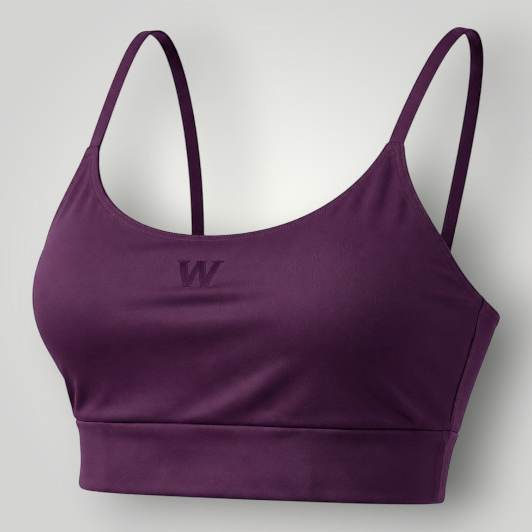 Top esportivo W One Brand Store cor vinho com alças fixas, média sustentação e tecido respirável de poliamida.