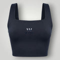Top W One Brand Store preto de poliamida com alta sustentação, decote quadrado e logo frontal para treinos.