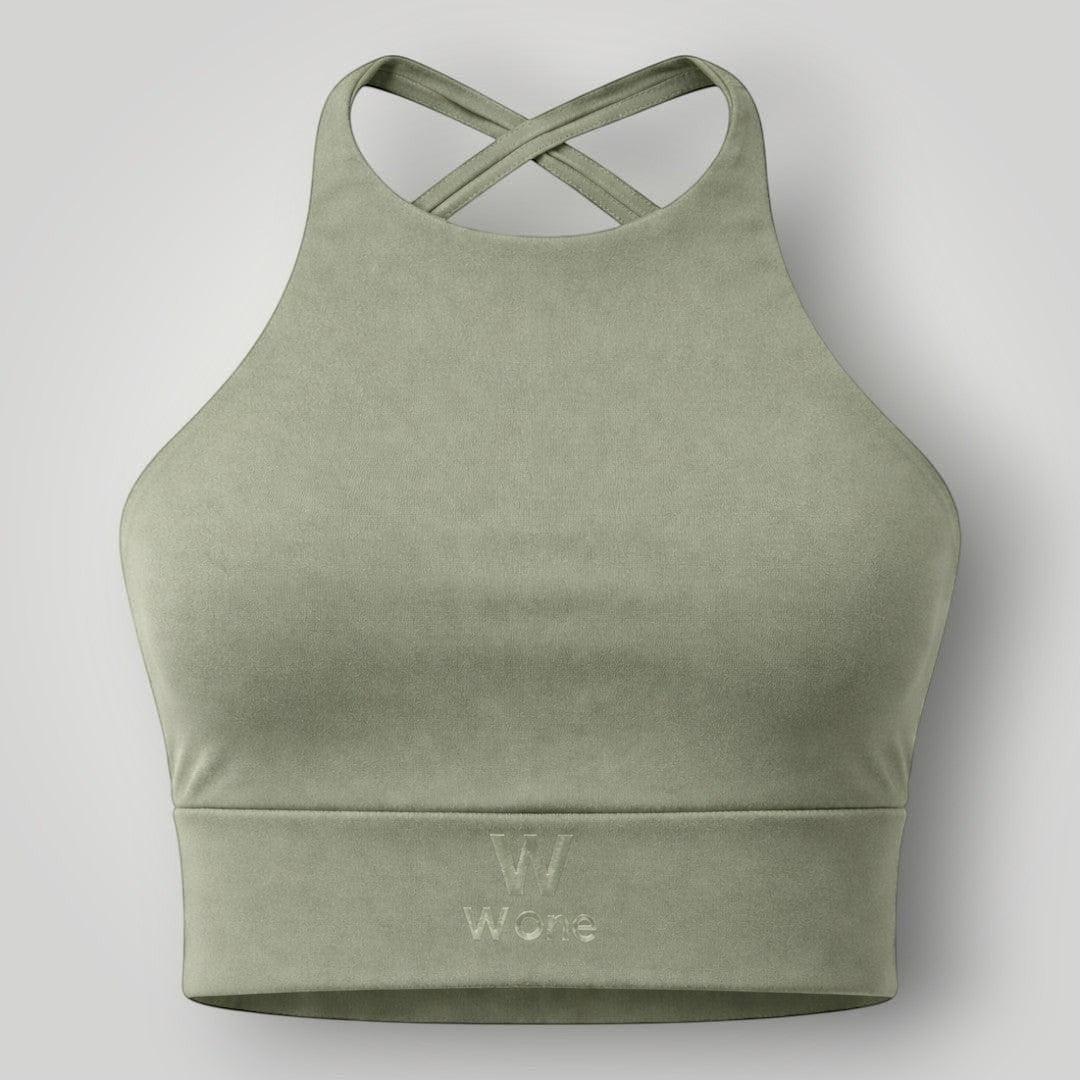 Top fitness W One Brand Store verde malva com alta sustentação, costas cruzadas e tecido de poliamida com proteção UV