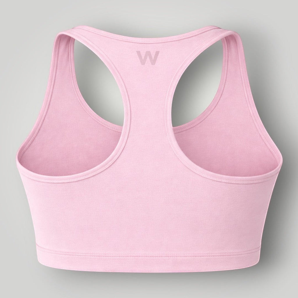 Top esportivo W One Brand Store rosa balé com modelagem nadador e média sustentação em tecido respirável