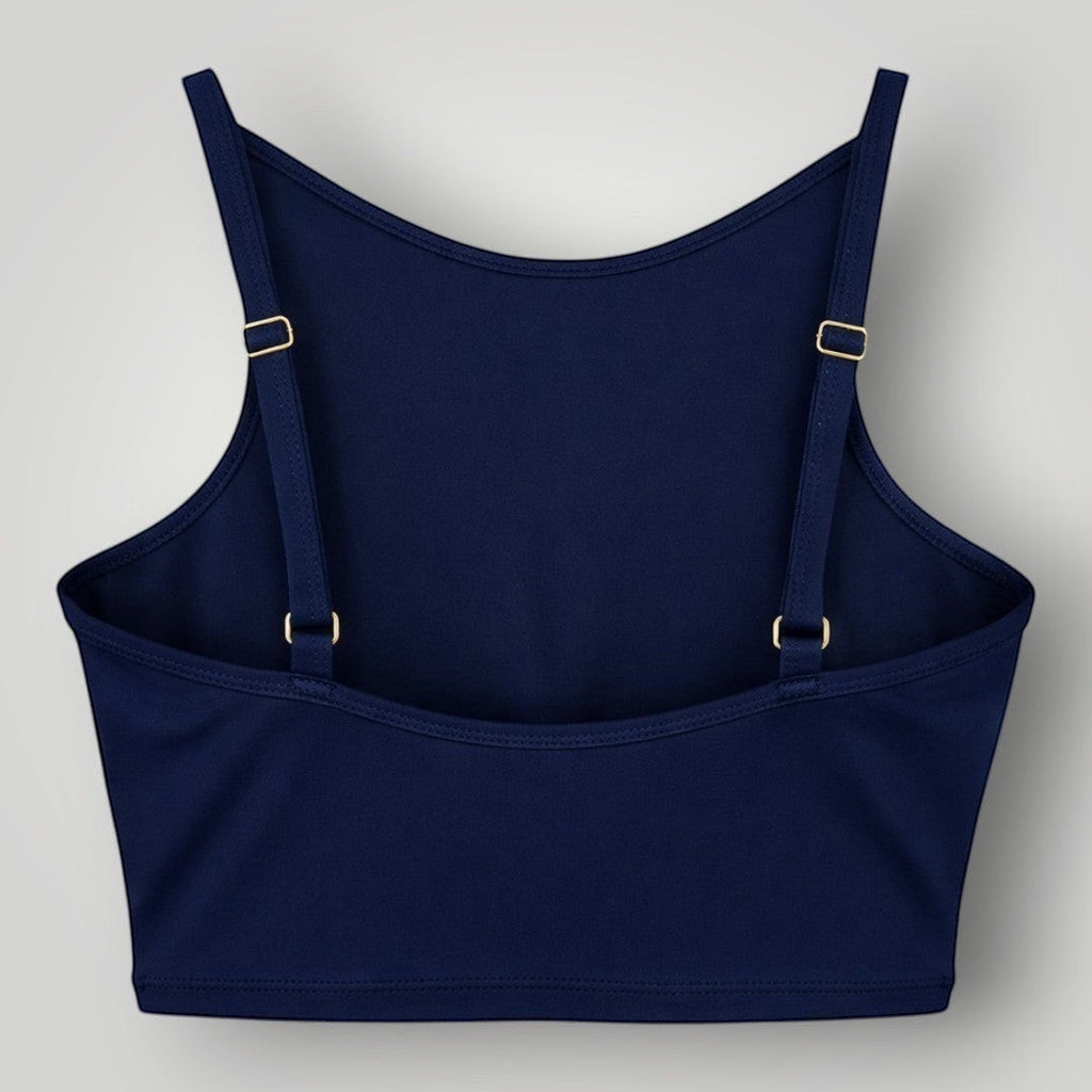 Top W One Brand Store Pulse azul marinho com frente alta, alças reguláveis e faixa nas costas para média sustentação.