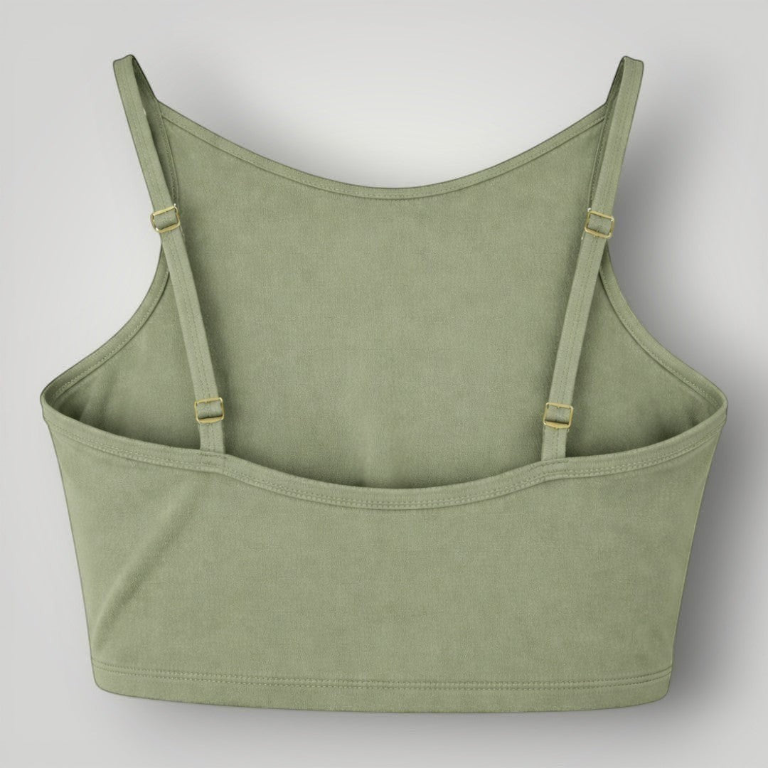Top W One Brand Store Pulse verde malva com frente alta, alças reguláveis e faixa nas costas para média sustentação.