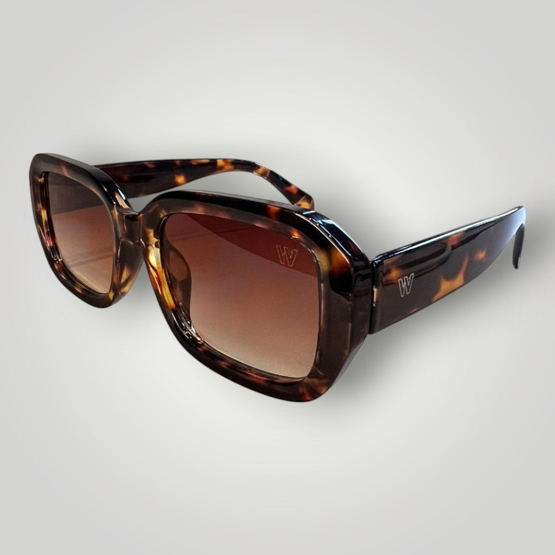 W One Brand Store rectangular acetate sunglasses with tortoise shell pattern and brown gradient lenses. Features prominent 'W' logo on temples.