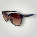 W One Brand Store maxi square acetate sunglasses with tortoise shell pattern and gradient brown lenses. Rounded edges and subtle 'W' logo detail.