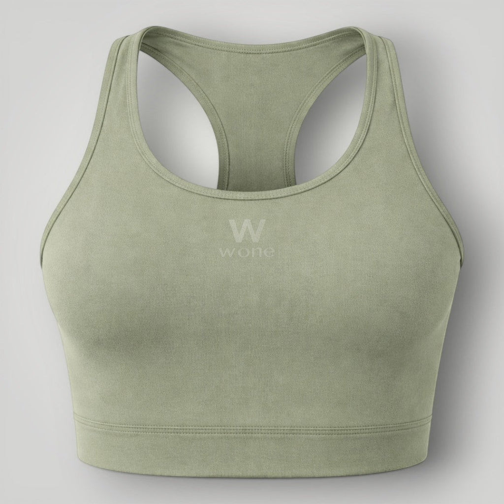 W One Brand Store green polyamide racerback fitness top with subtle logo detail.