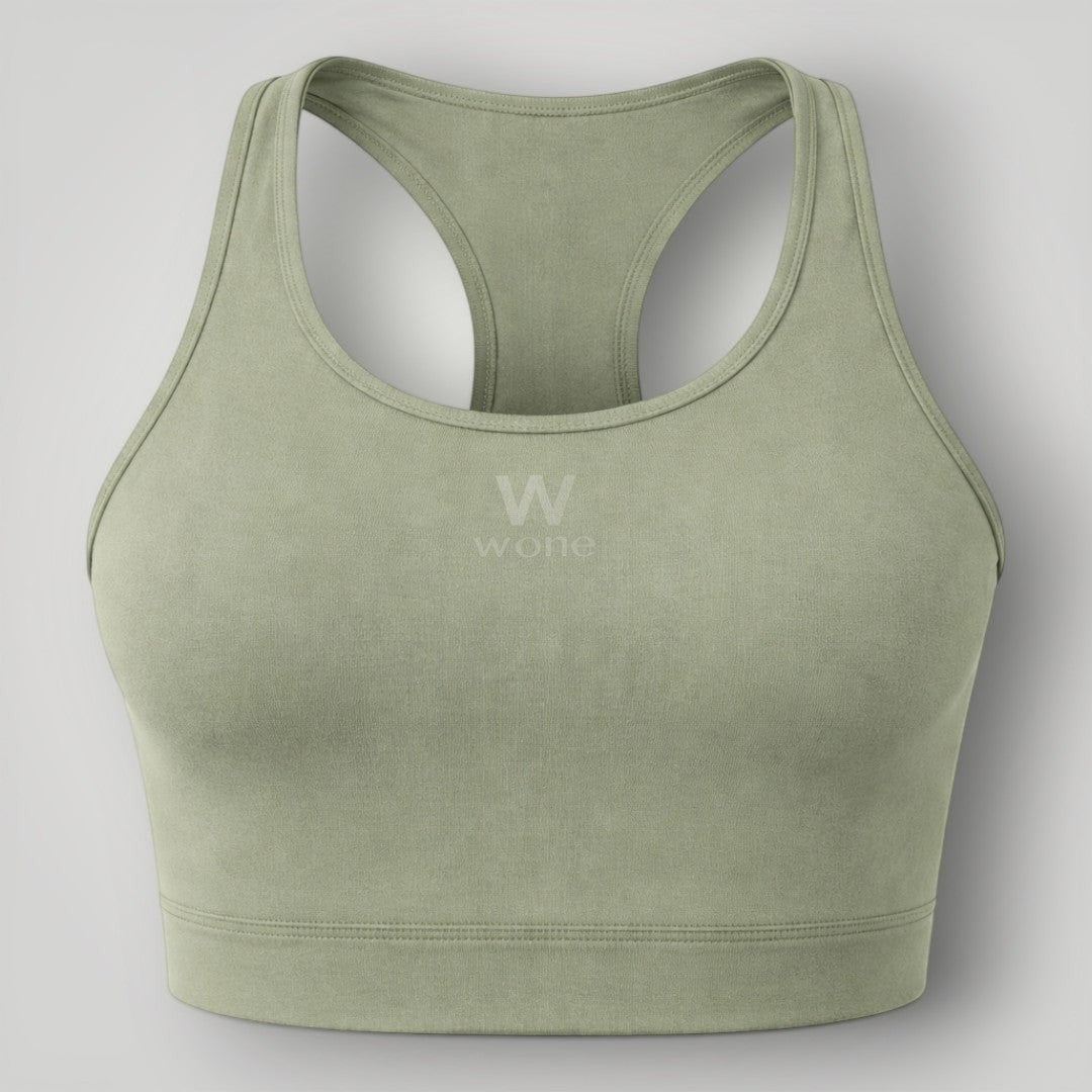 W One Brand Store green polyamide racerback fitness top with subtle logo detail.